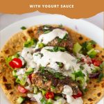 Pinterest image for kofta kebabs with salad and tahini.