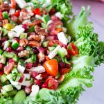 A platter with pomegranate salad.
