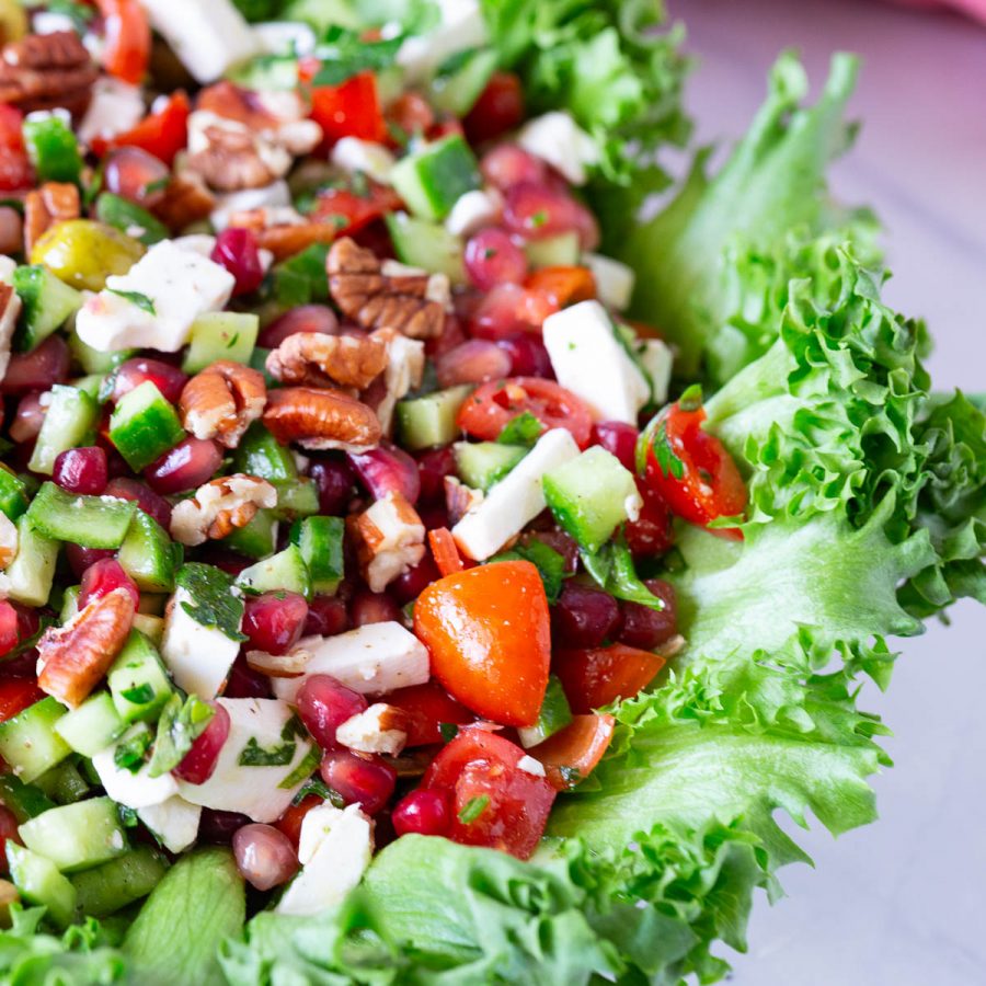 A platter with pomegranate salad.