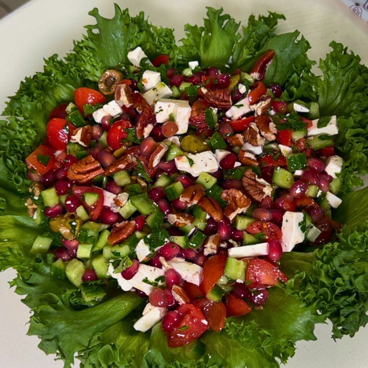 Pomegranate salad on a platter.