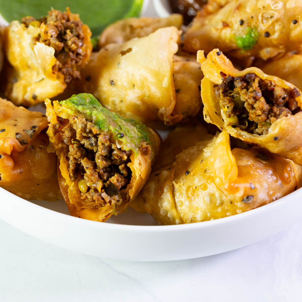 A plate with kheema samosa.