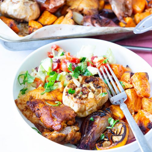 A plate served with chicken and veggies.