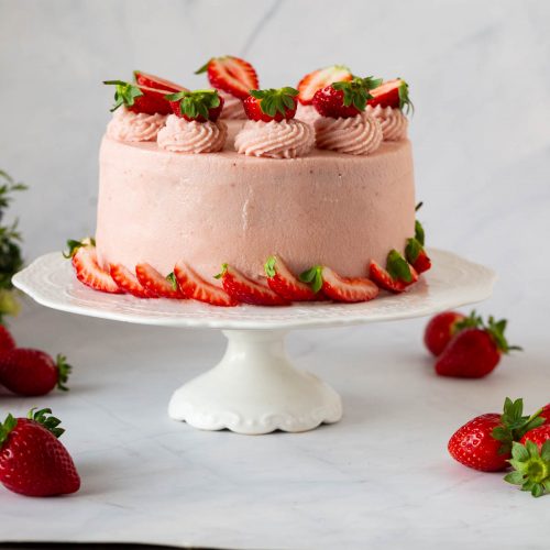 A cake with cream cheese frosting.