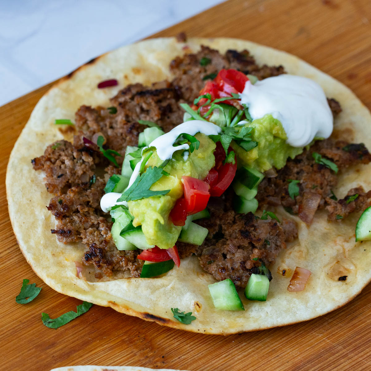 healthy smash tacos with beef and yogurt sauce