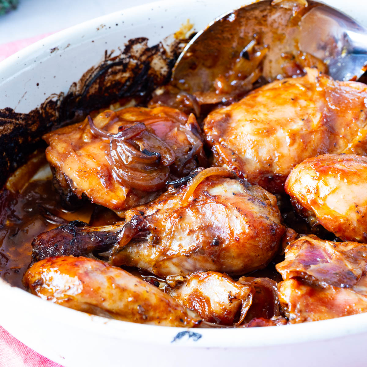 A baking dish with hot honey chicken.