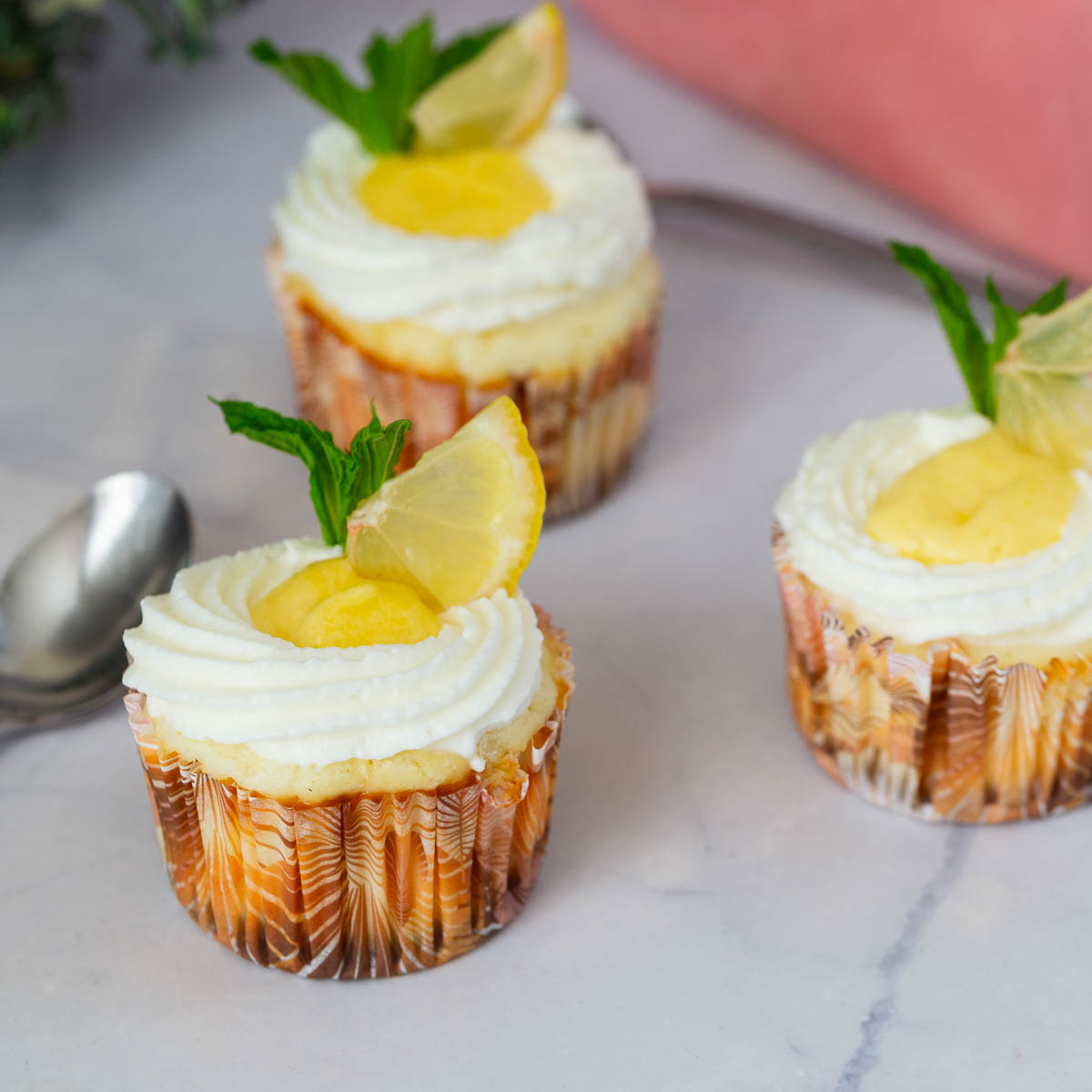 Baked mini lemon cheesecakes.