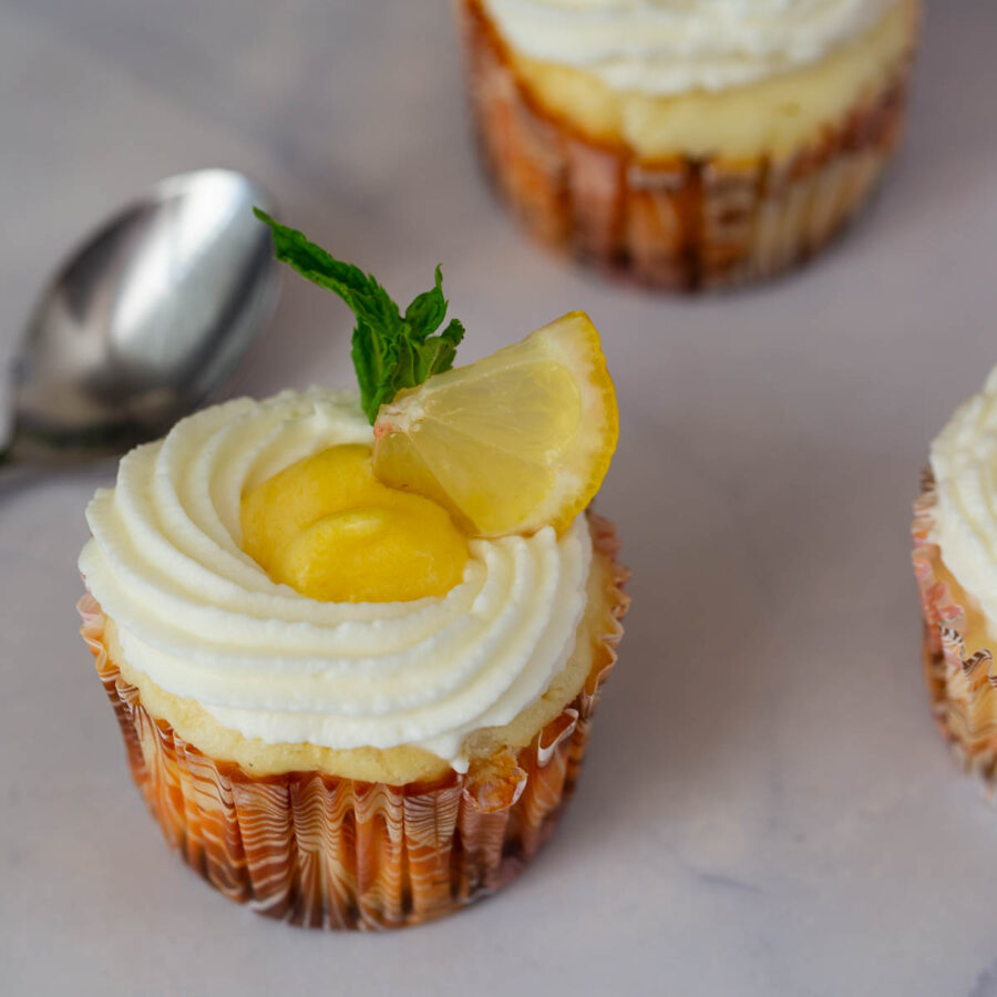 Mini baked cheesecakes on the table.