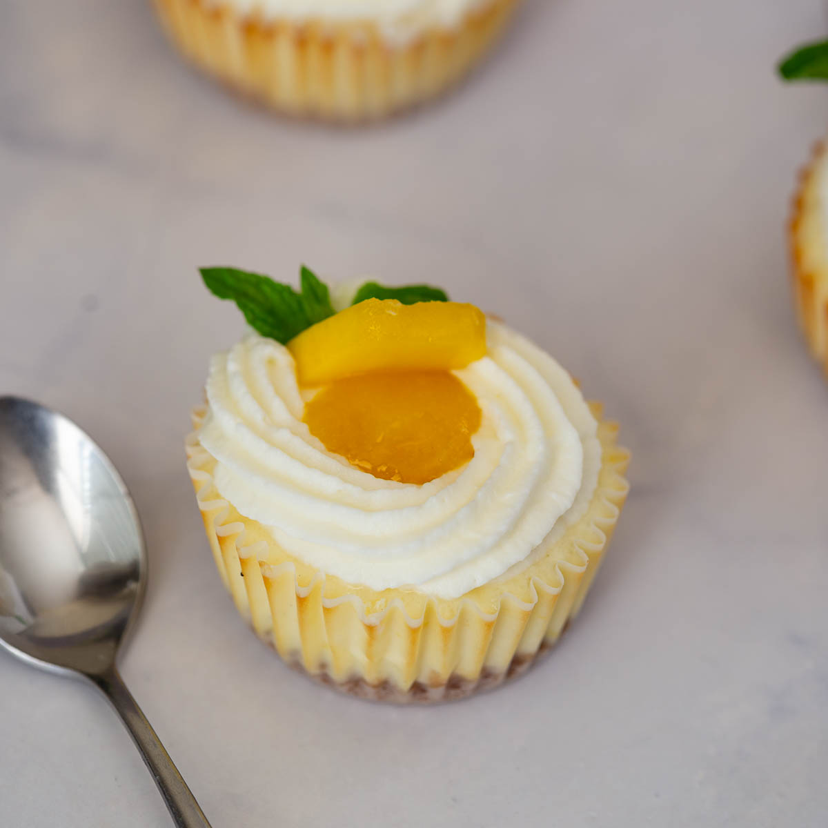A baked mini cheesecakes on the table.