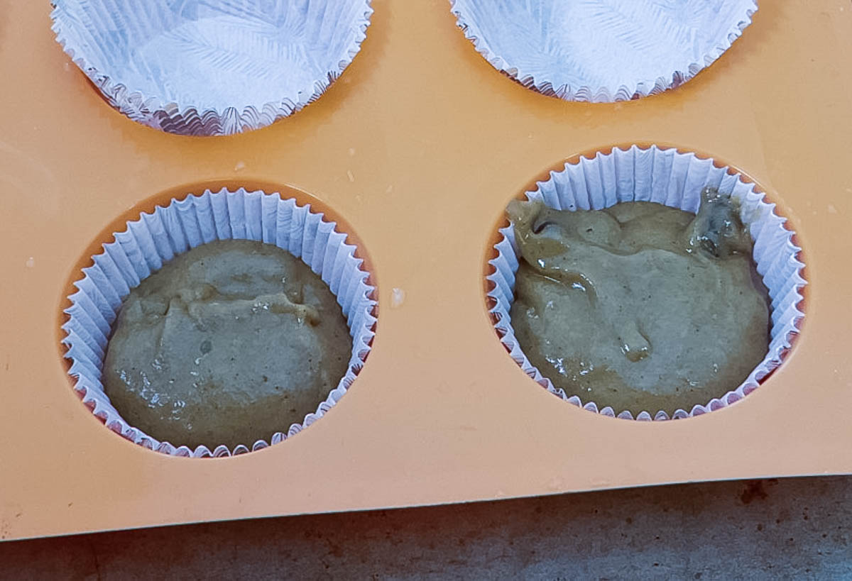 Cupcakes batter in muffin tin.