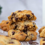 Fresh stacked chocolate chip cookies.