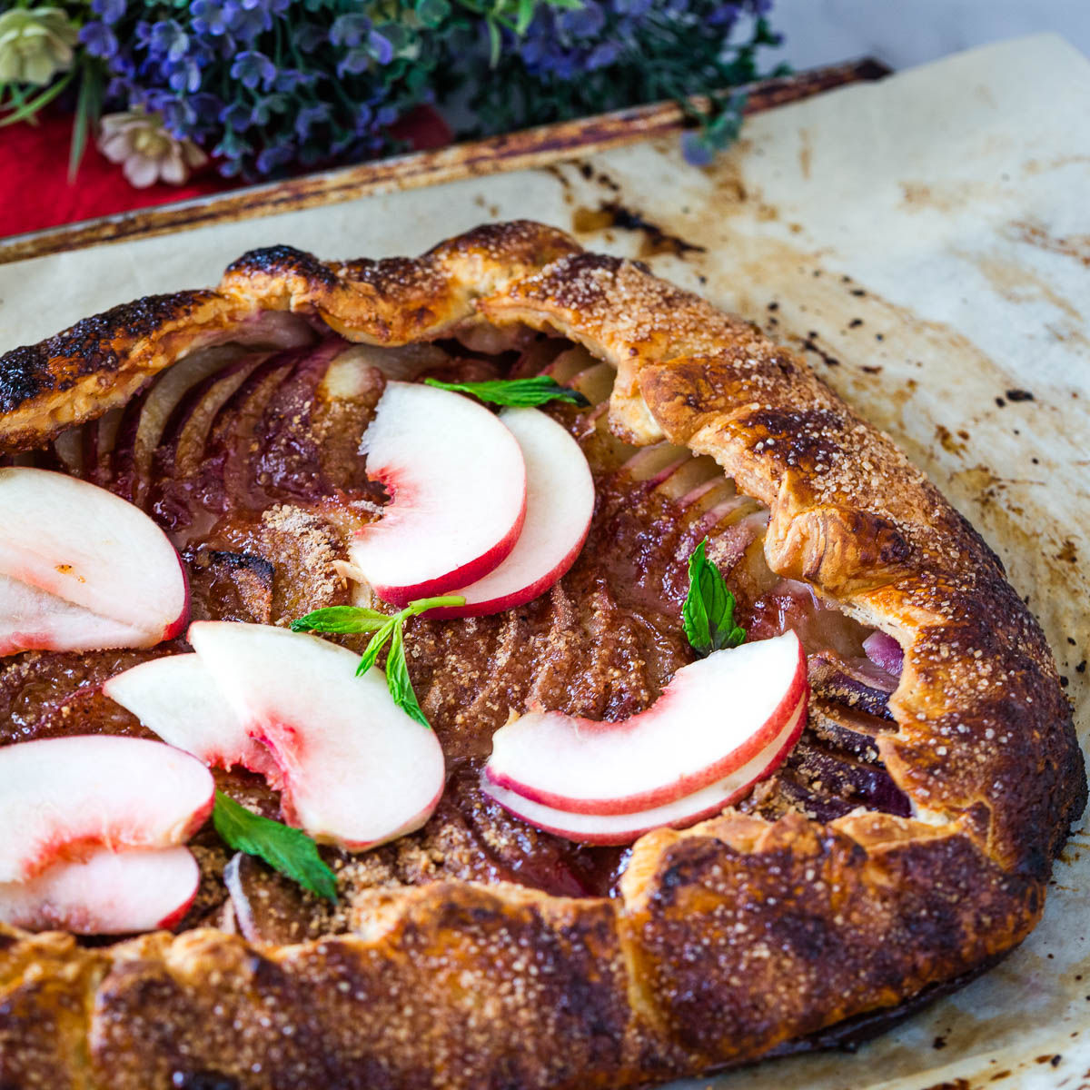 Peach Galette with Puff Pastry on the table.