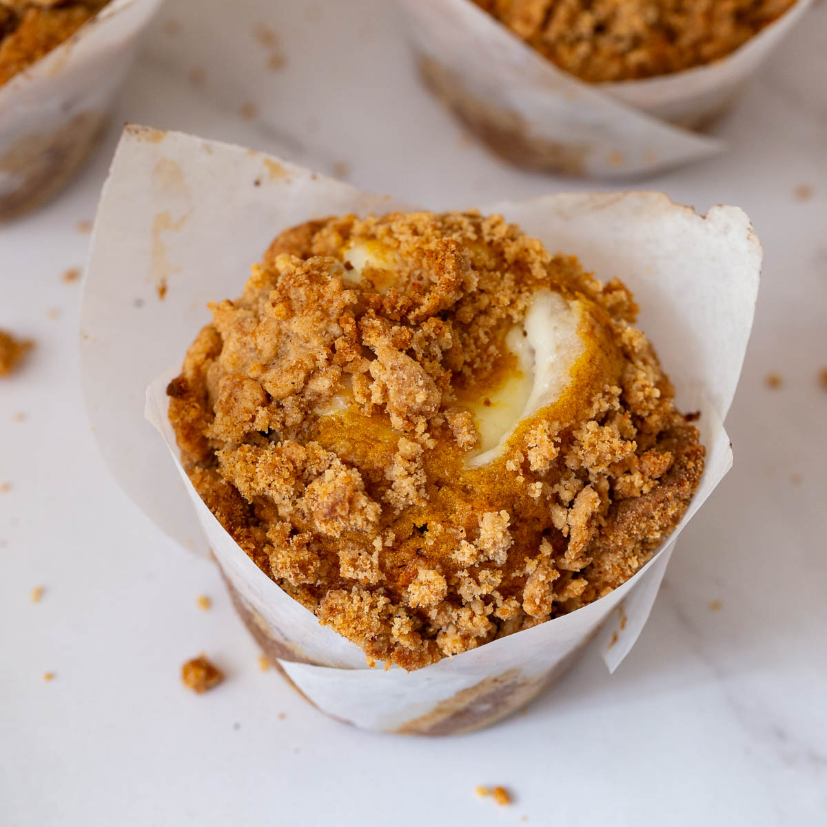 Cream Cheese Pumpkin muffins on the table.