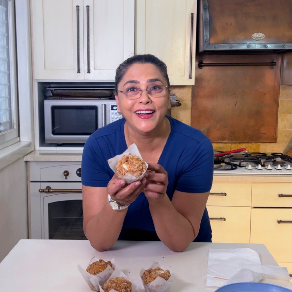 Veena Azmanov with Pumpkin muffins.