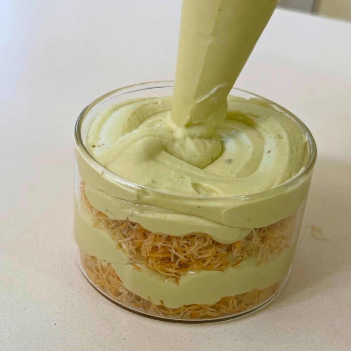 A trifle with pistachio cream and kataif.