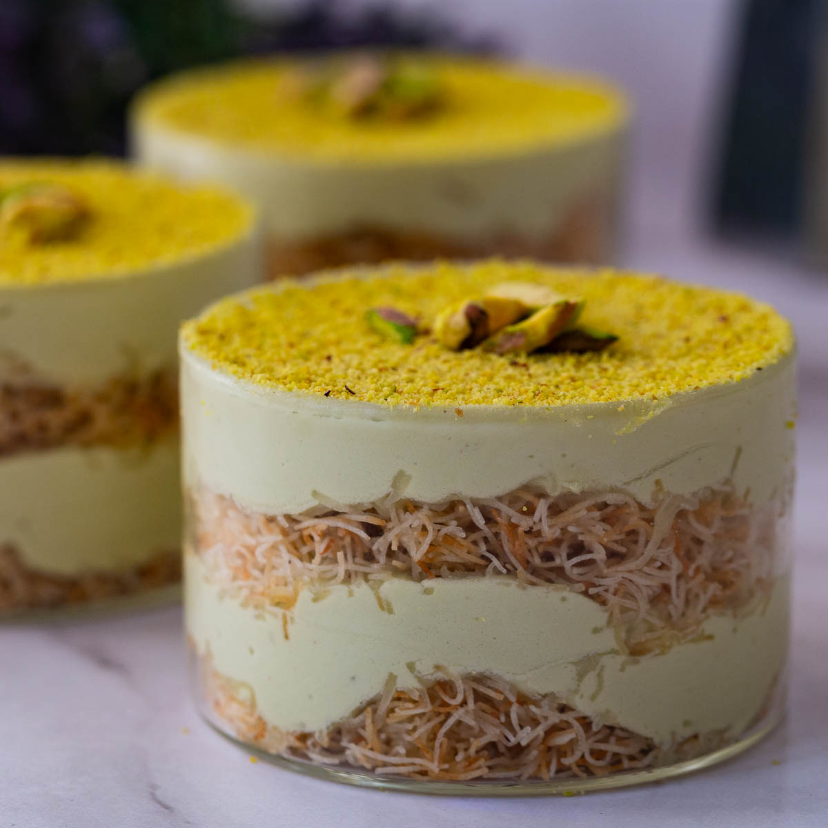 Pistachio desserts trifle on display.