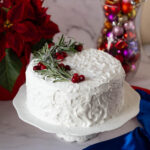 A Christmas cake frosted with marzipan and royal icing.