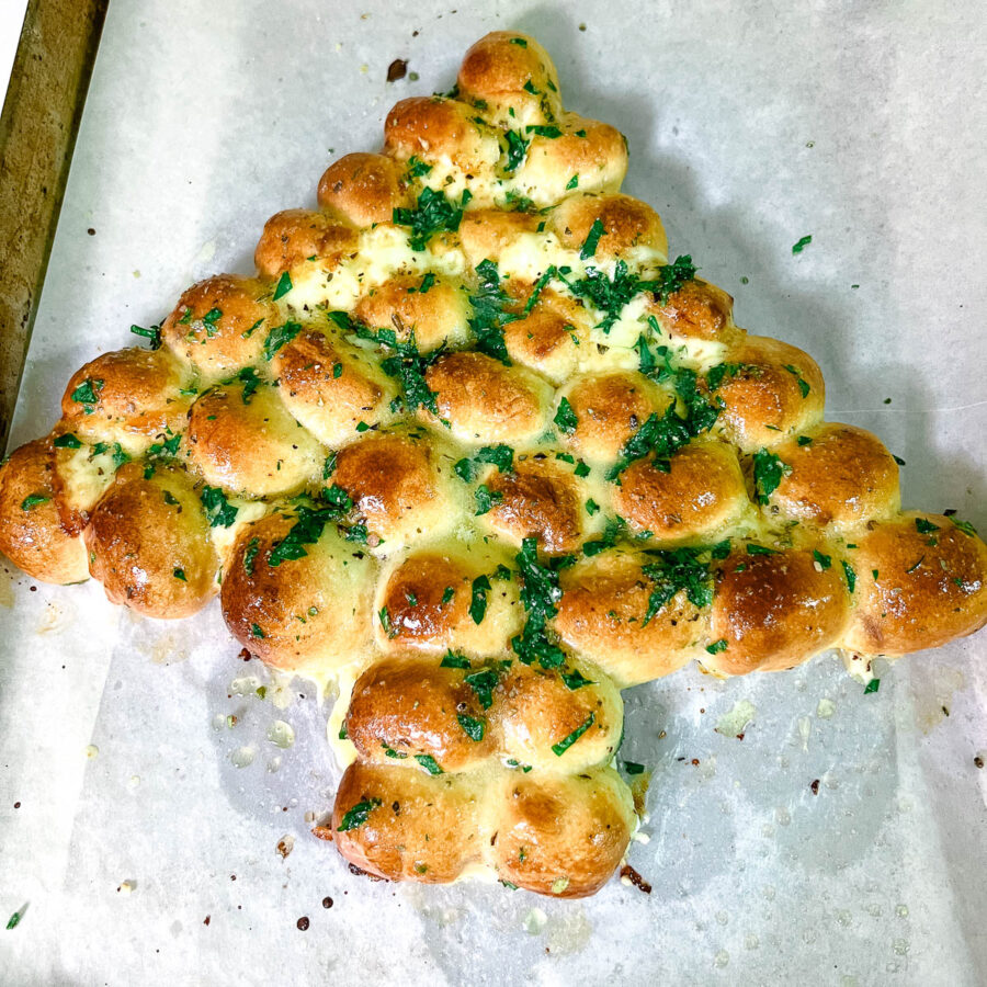 Christmas Tree garlic butter bread on a baking tray.