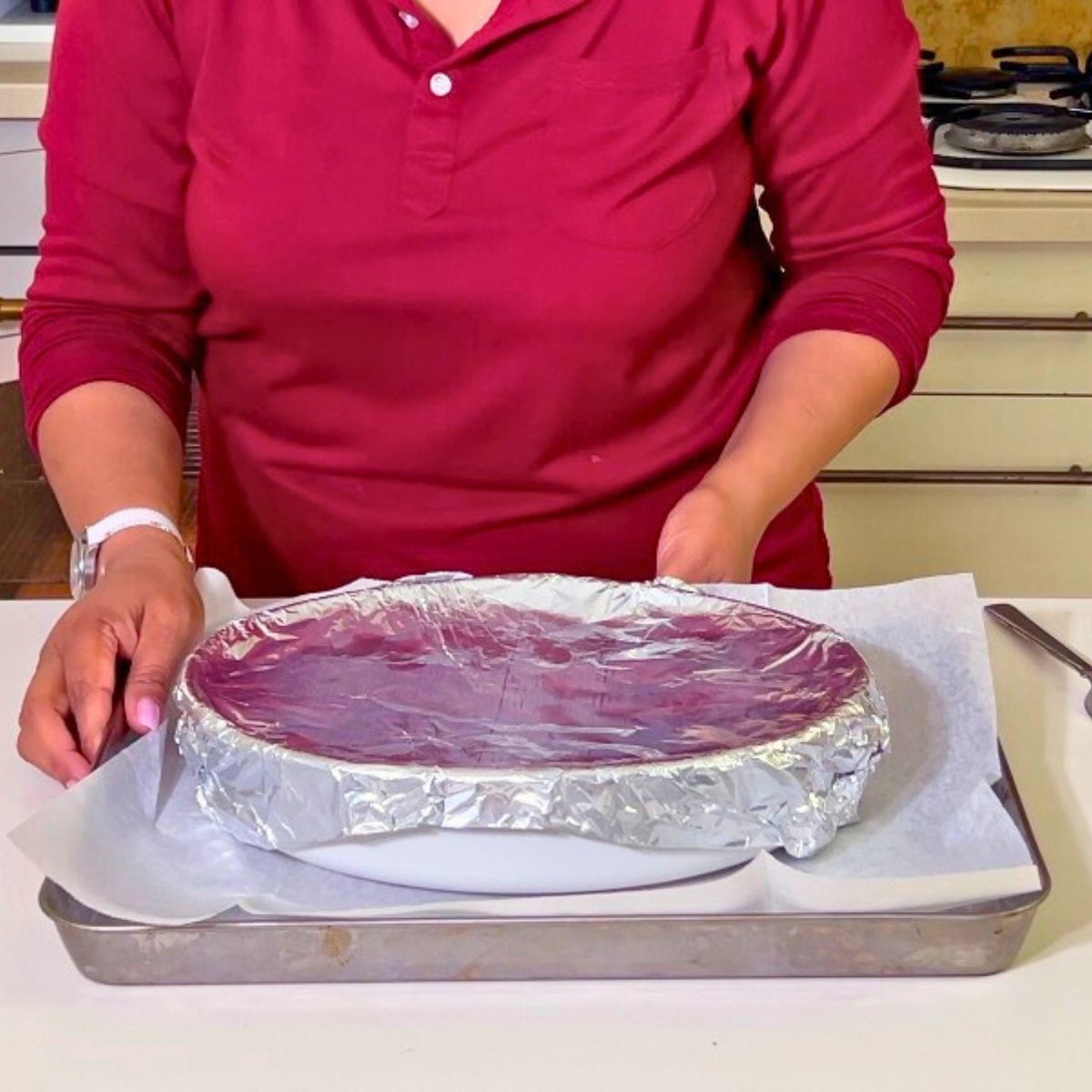 A baking dish covered with foil.