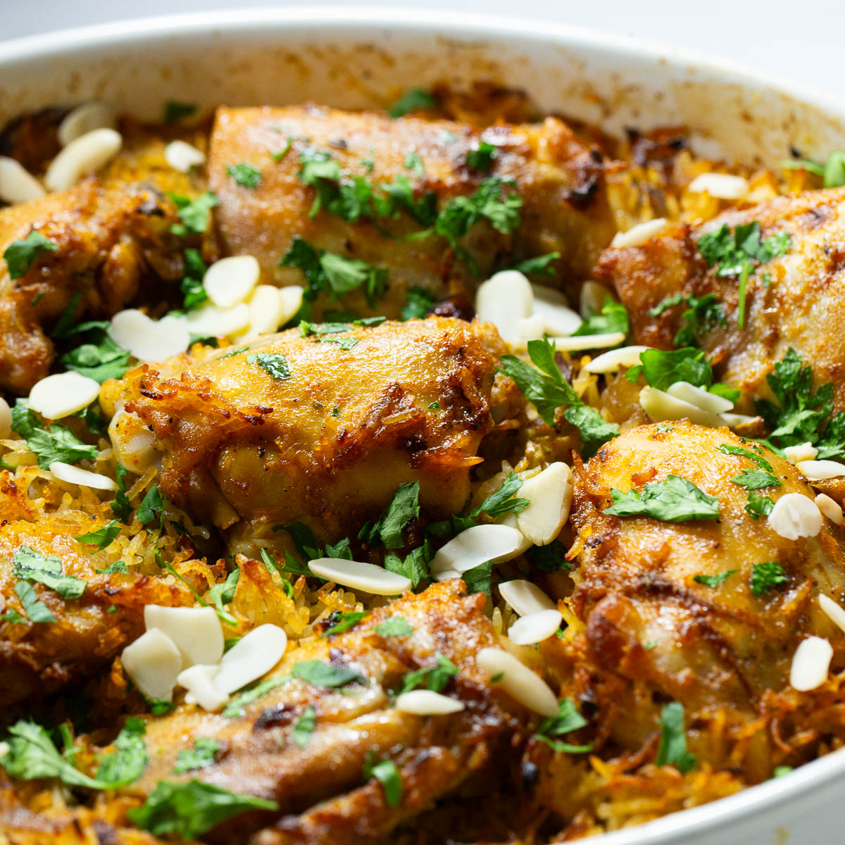A baking dish with chicken and rice.