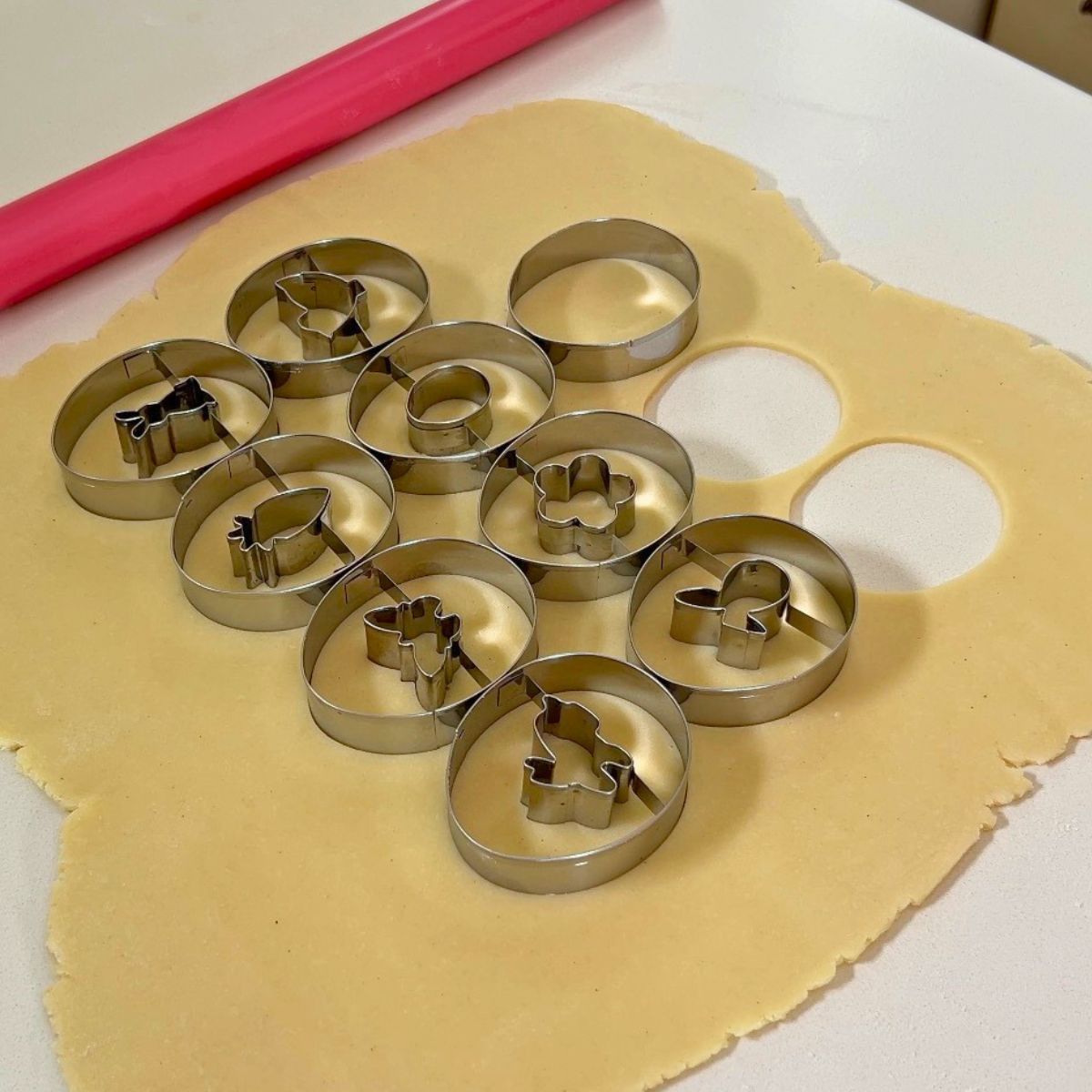Easter Shaped cookie cutters on rolled dough.