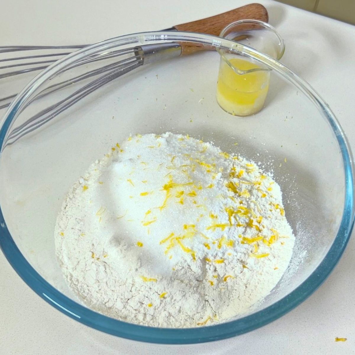 Pancake batter in a glass bowl.