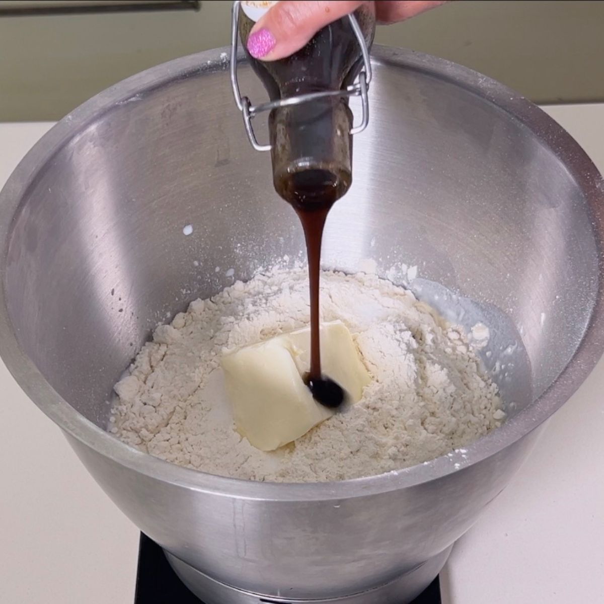 A sweet dough with vanilla in a stand mixer.