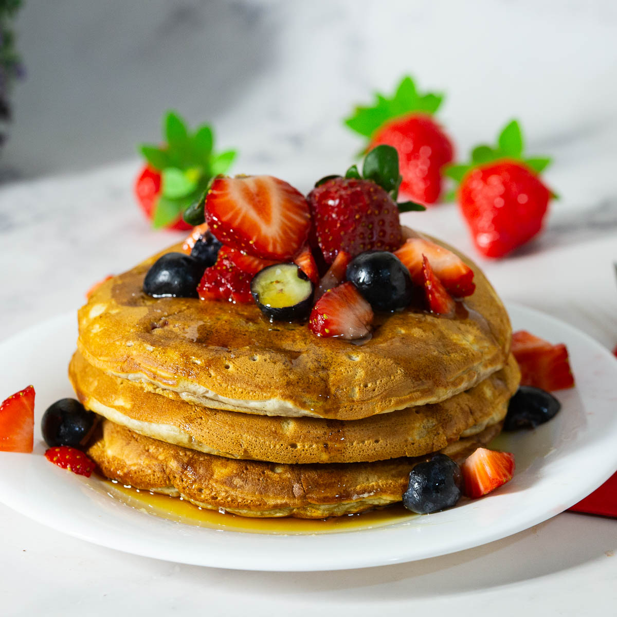 Stack of pancakes on the table.