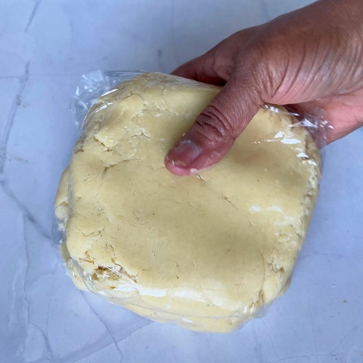 Sugar cookie dough with powdered sugar.