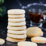 Stack of butter cookies on the table.