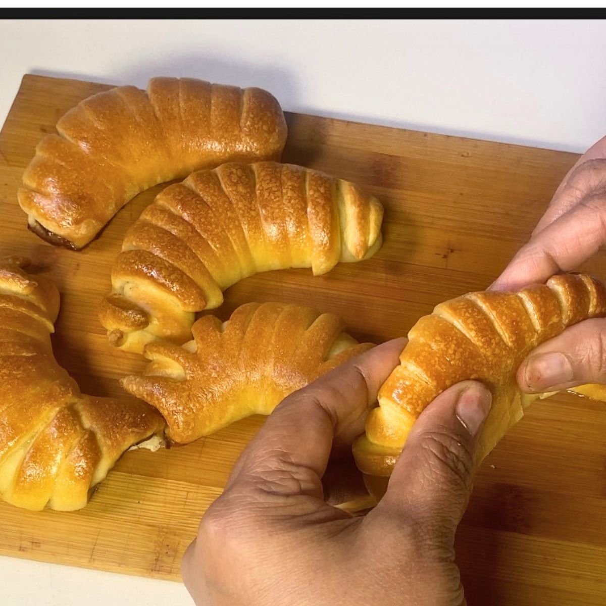 Bread Buns with Nutella on the table.
