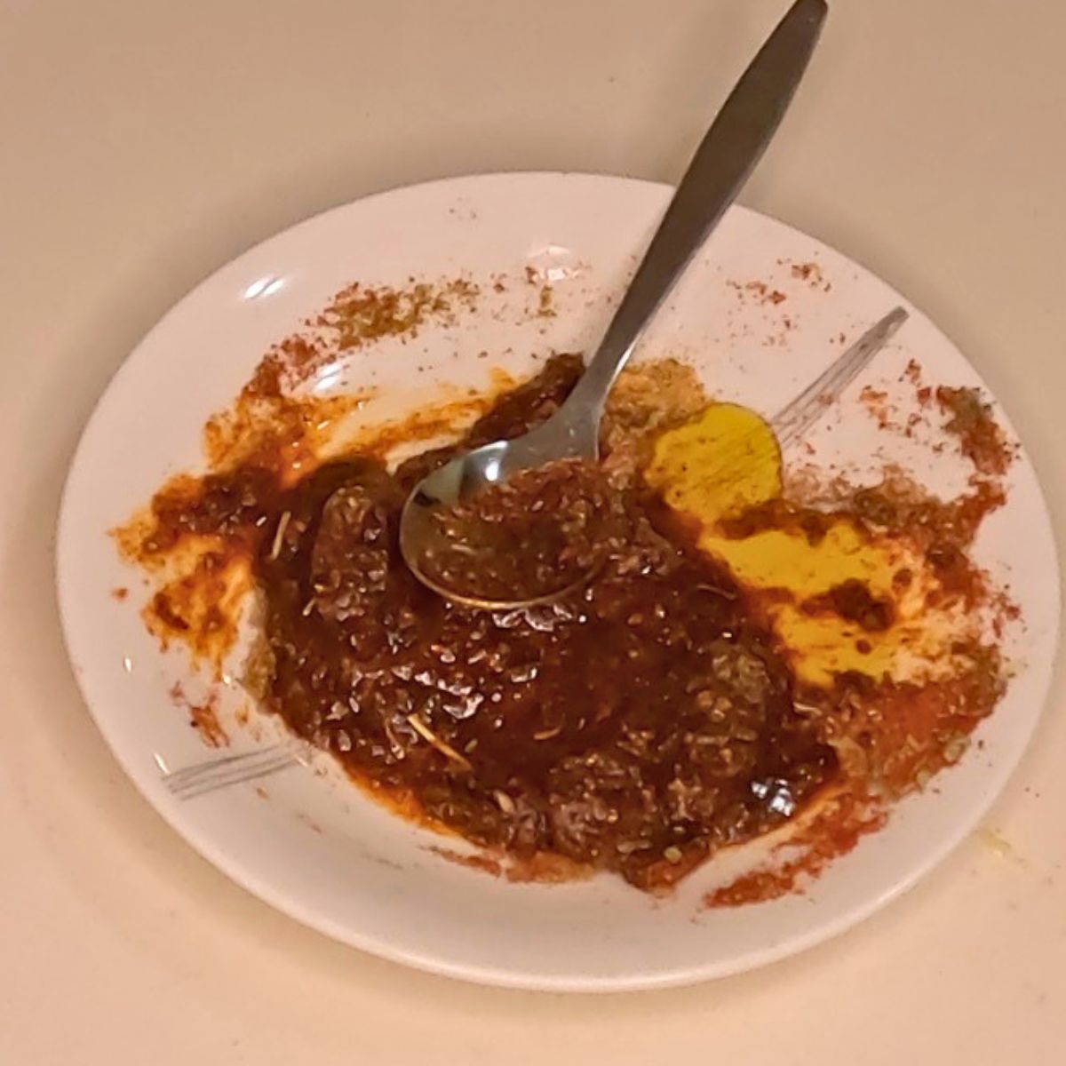 A sauce with spices in olive oil.