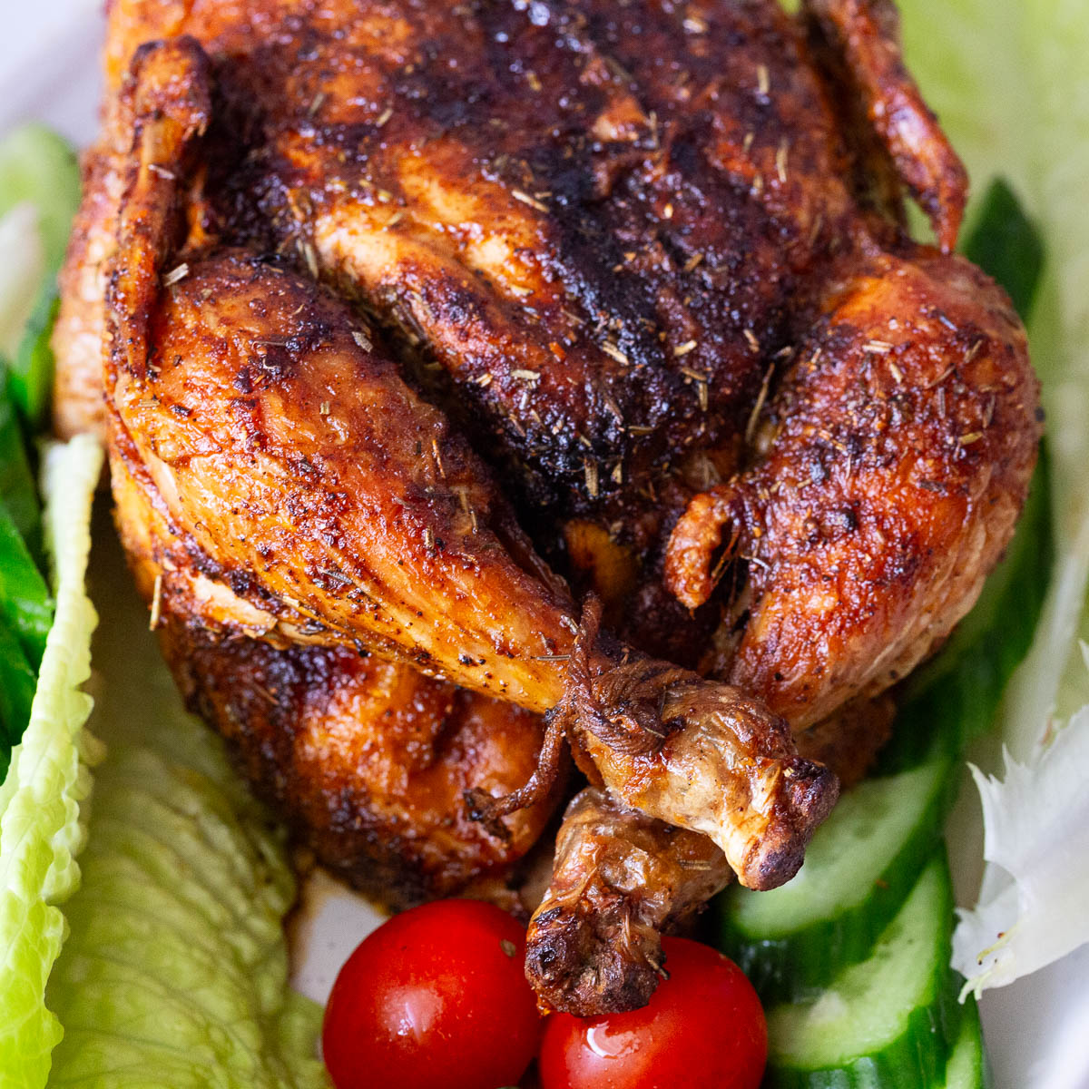 Air Fryer roast chicken on a platter.