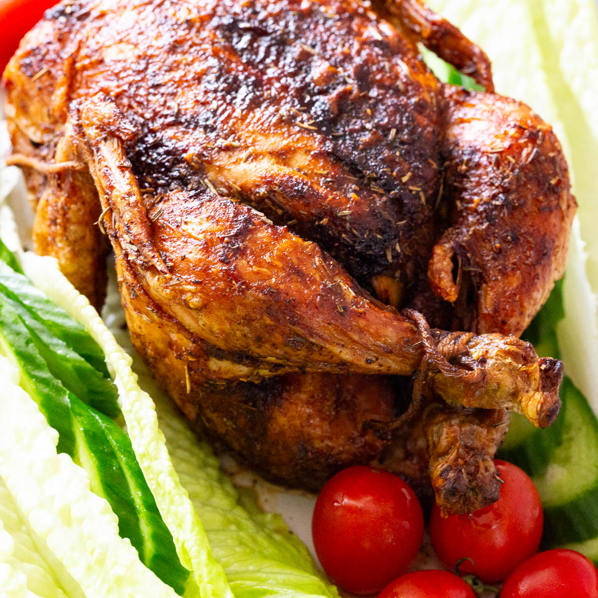 A whole roasted chicken in the air fryer.