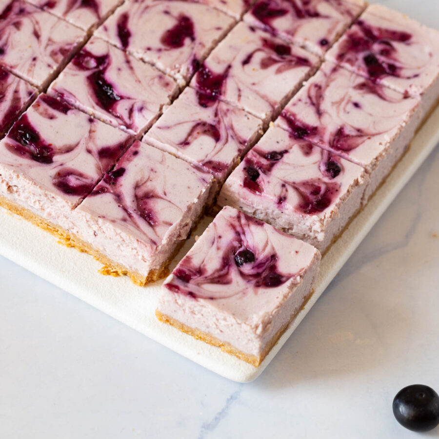 Blueberry Cheesecake bars on the tray.