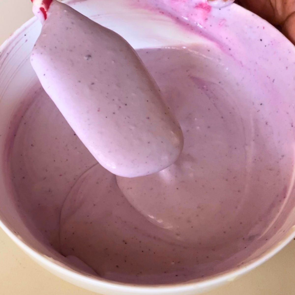 Blueberry Cheesecake batter in a bowl.