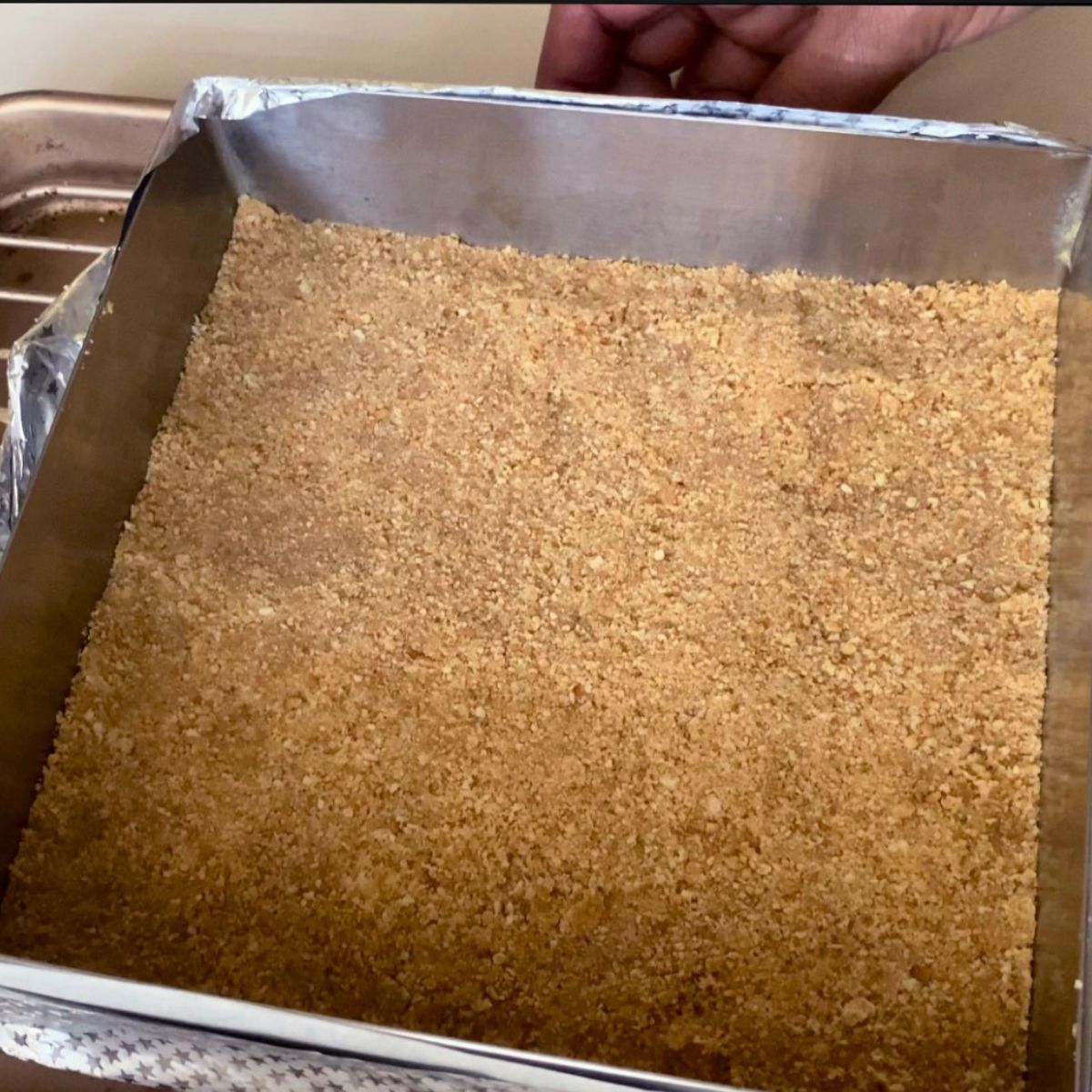Cookie crust in 8inch square pan.