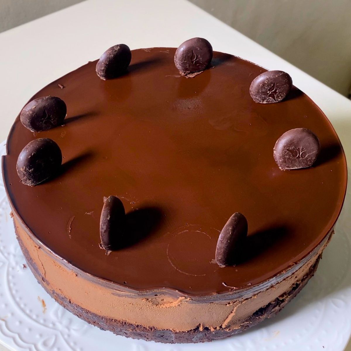 A chocolate mousse cake on the table.