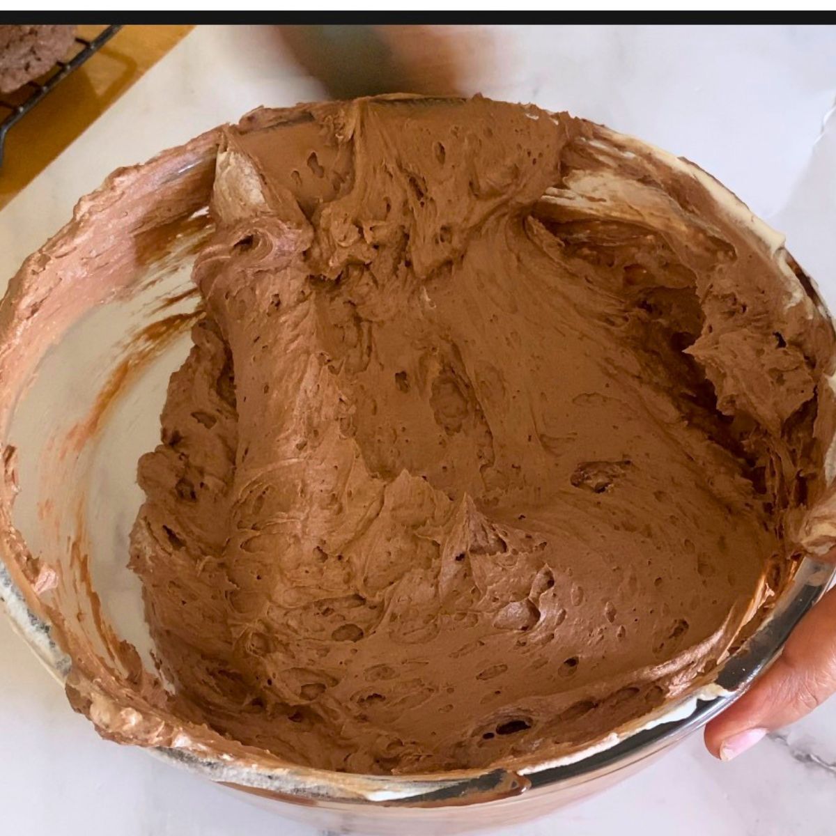 Chocolate mousse in a glass bowl.