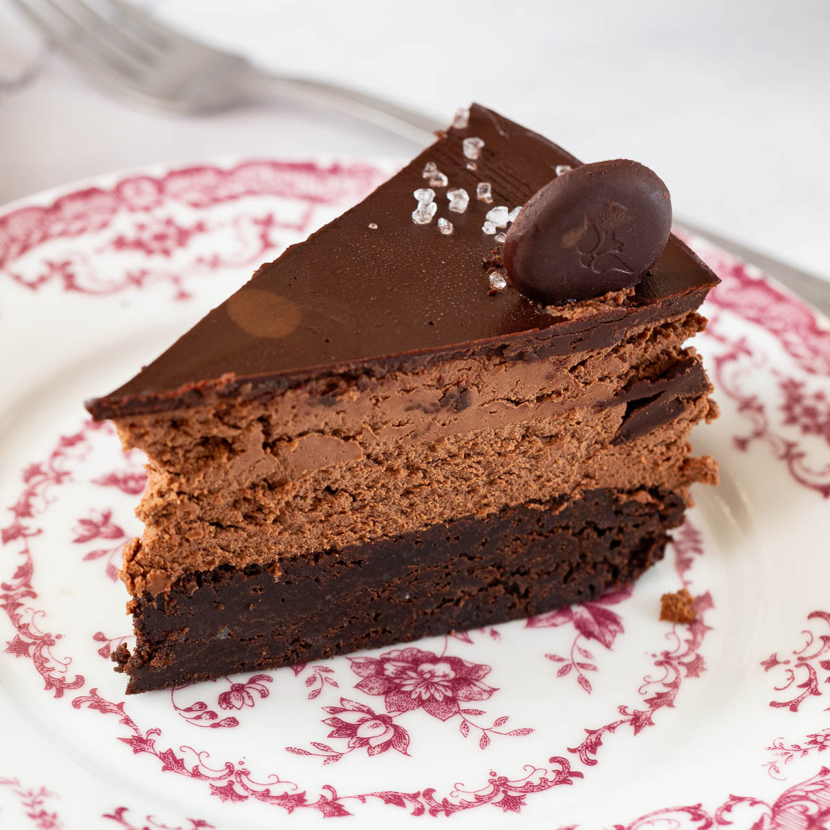 A slice of mousse cake on the plate.