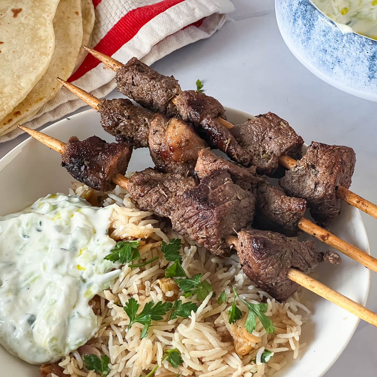 Pinterest image for Lamb Souvlaki Greek Lamb Skewers.