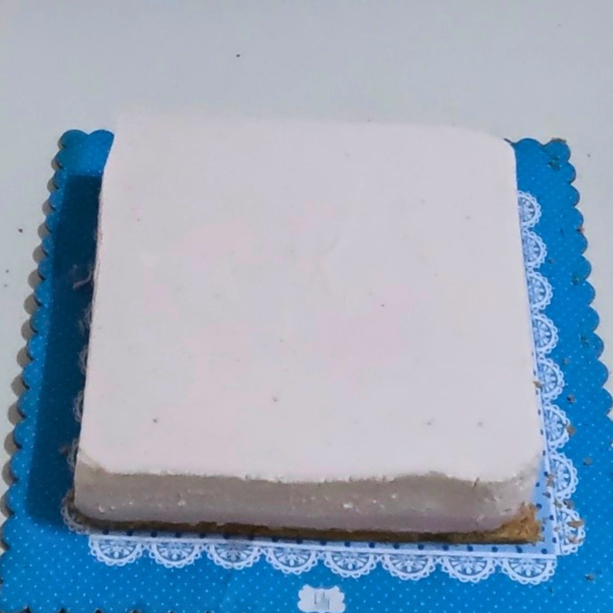 A slab of ombre strawberry mousse.