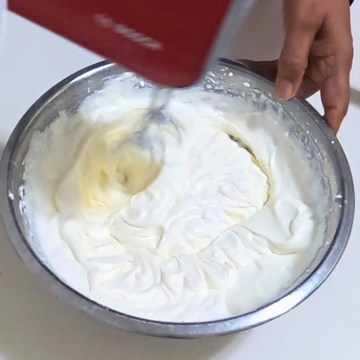 A bowl with cream cheese mousse.