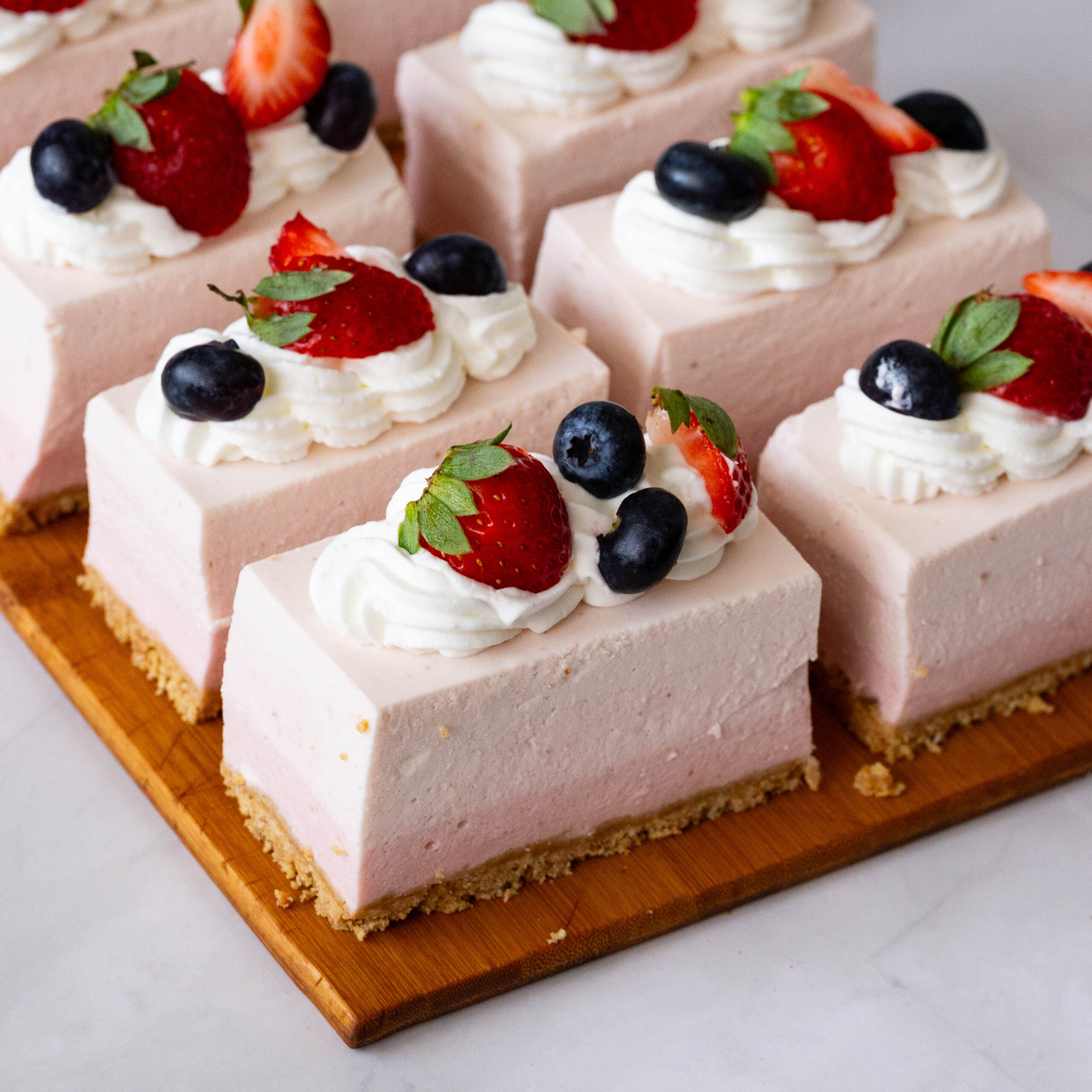 8 Ombre Mousse Slices on the table.