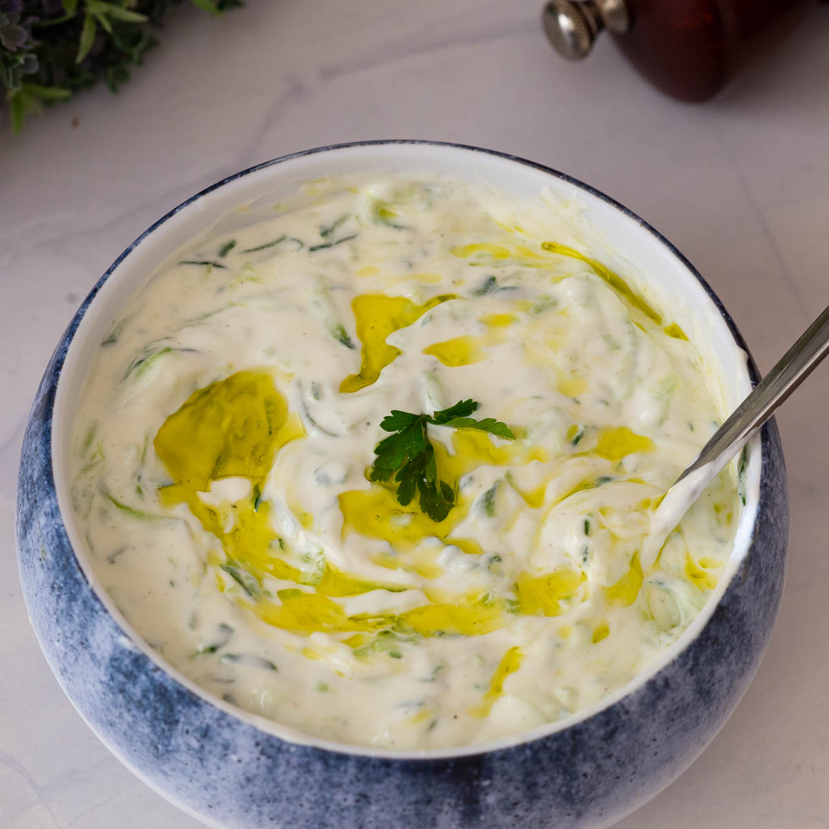 Tzatziki sauce in a bowl.
