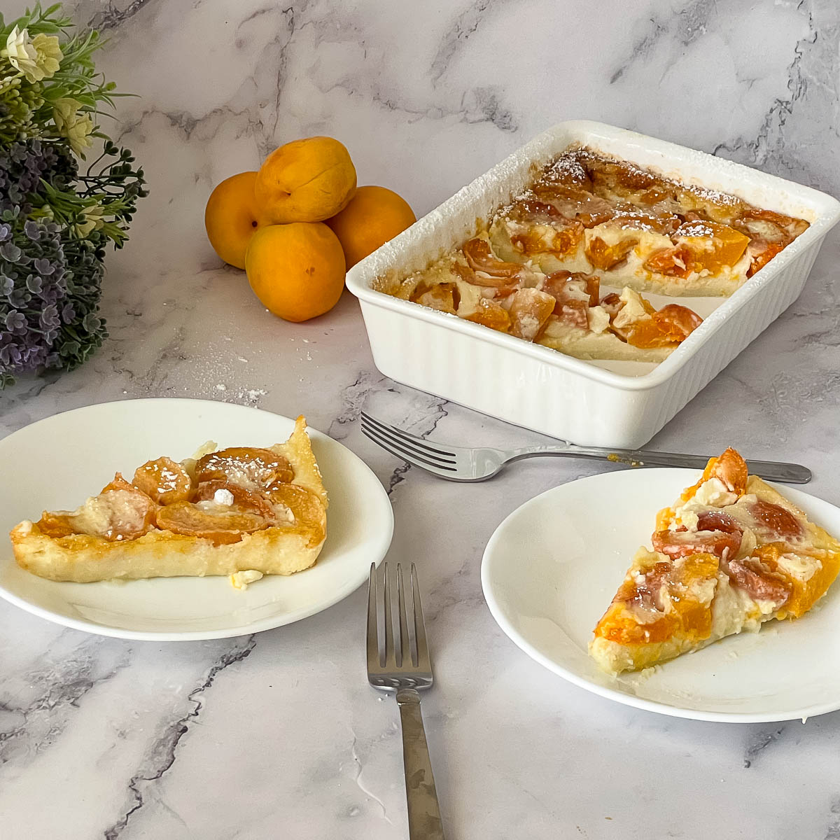 A plate with apricot clafoutis.