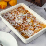 A baking dish with apricot clafoutis.