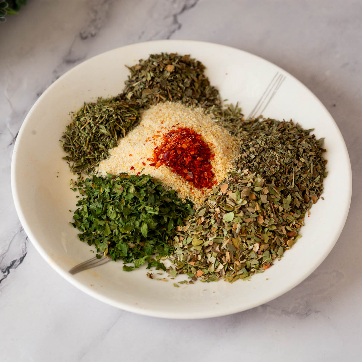 A plate with a mix of spice mix.
