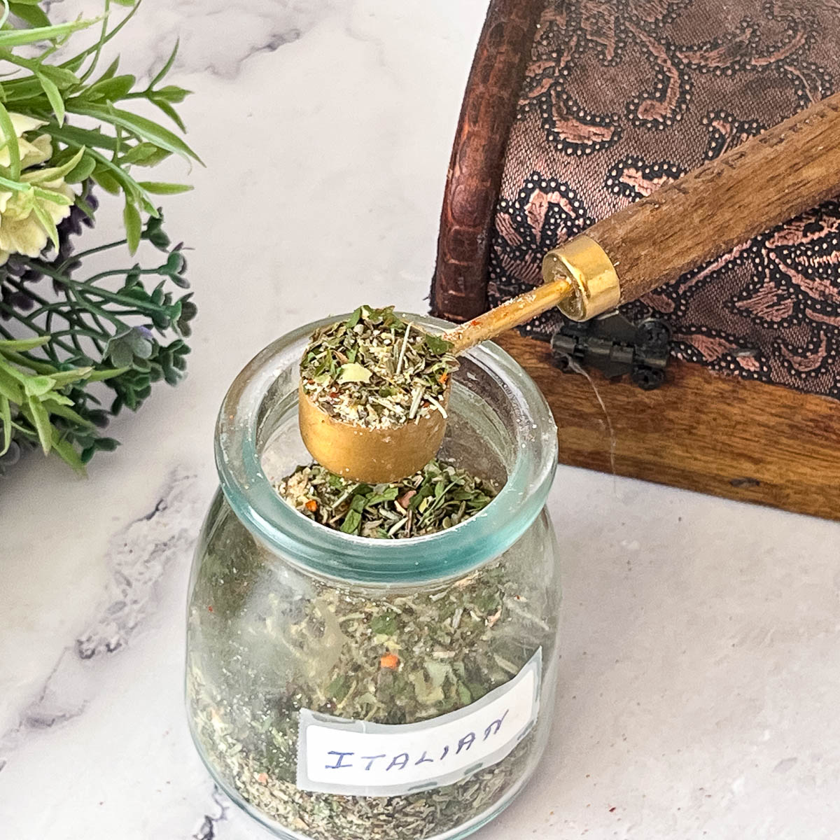 Italian Seasoning in a spice jar.