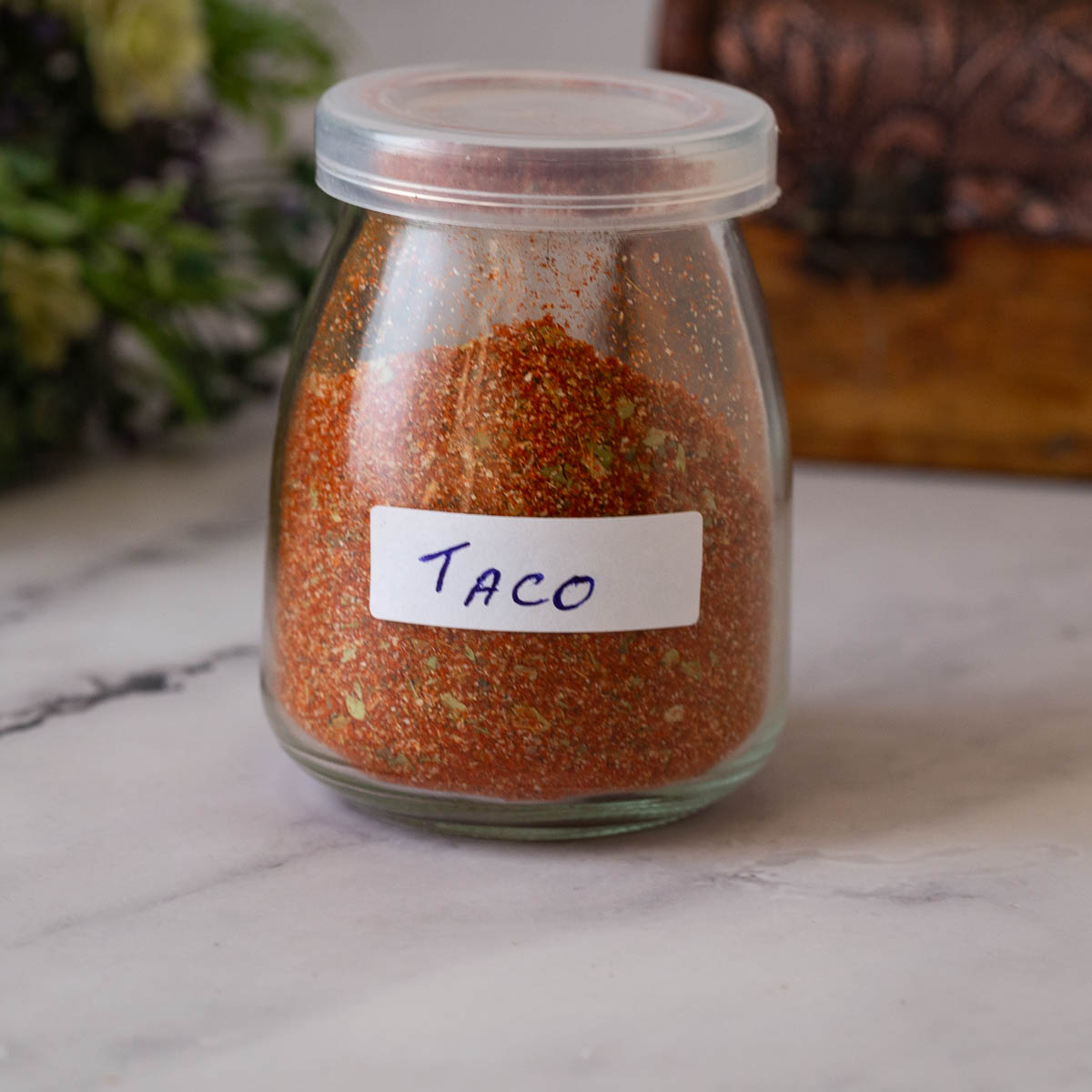 A jar with taco seasoning.