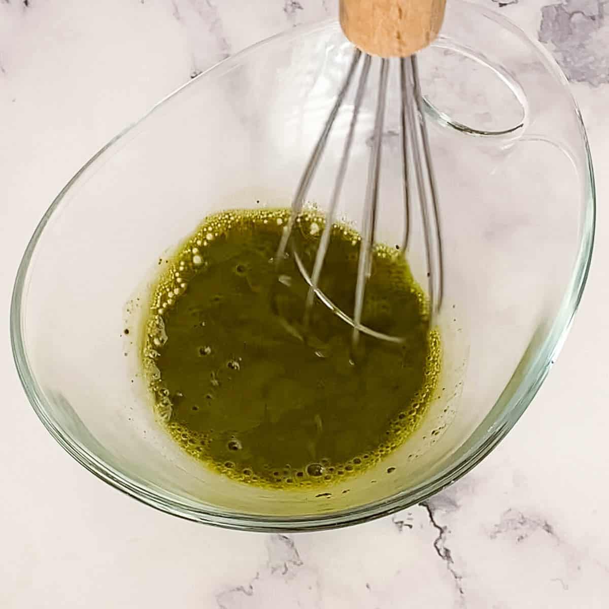 Making matcha with hot water.